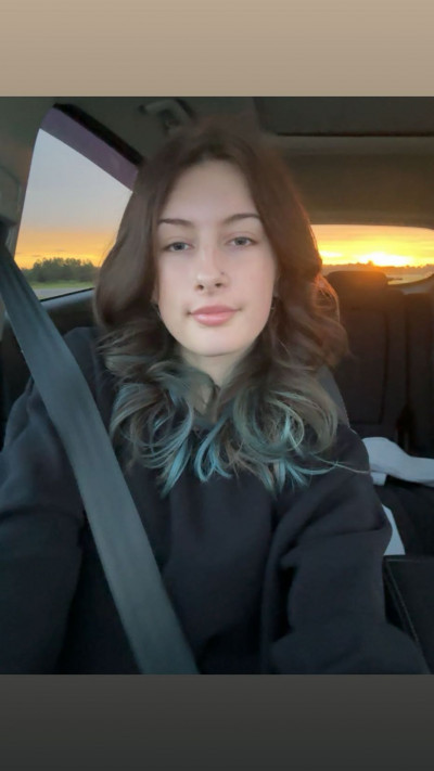 K.