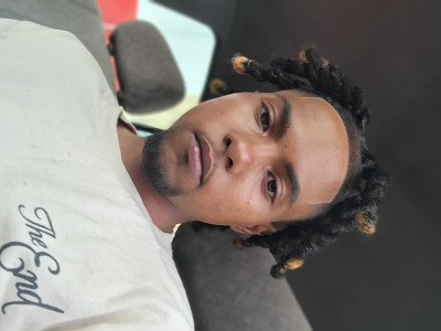 J.