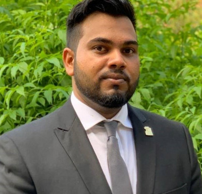 K.