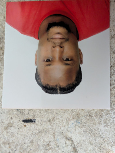 J.