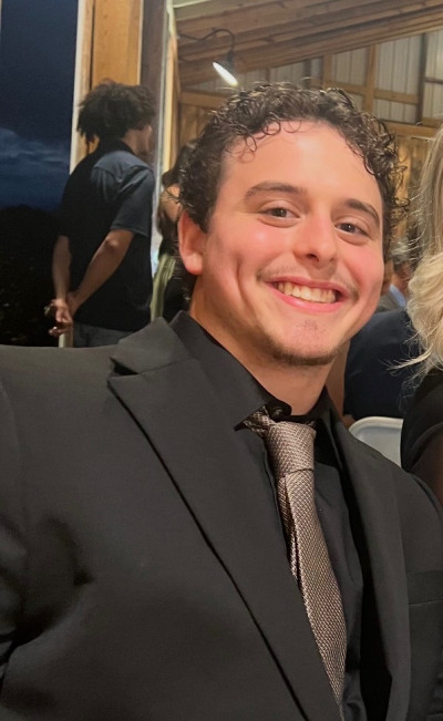 M.