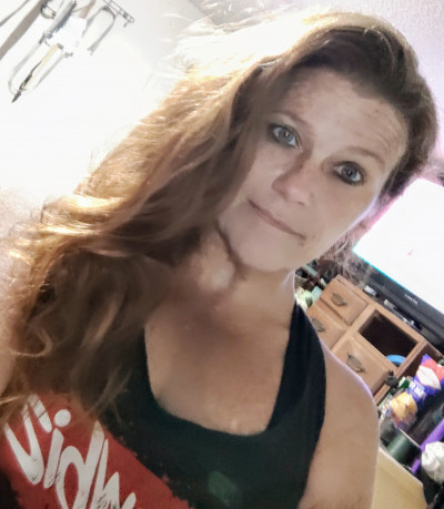 K.
